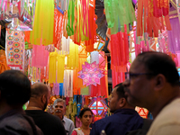 People shop for lanterns at a market ahead of the Hindu festival of Diwali in Mumbai, India, on October 23, 2024. (