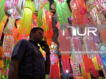 People shop for lanterns at a market ahead of the Hindu festival of Diwali in Mumbai, India, on October 23, 2024. (