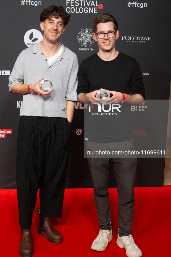 Tobias Schaefter, the climate story category winner, and Mathias Schweikert, from the climate story category, are seen on the red carpet of...