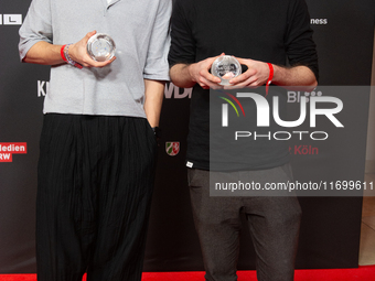 Tobias Schaefter, the climate story category winner, and Mathias Schweikert, from the climate story category, are seen on the red carpet of...