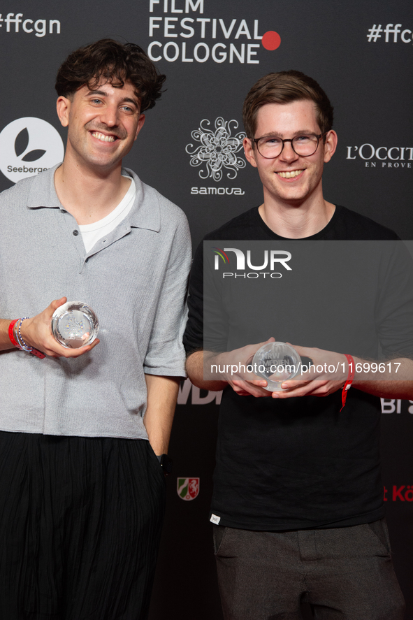 Tobias Schaefter, the climate story category winner, and Mathias Schweikert, from the climate story category, are seen on the red carpet of...