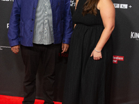 Michael Premo, a filmmaker who receives the Der Phoenix Preis with his companion, is seen on the red carpet of Film Palast in Cologne, Germa...