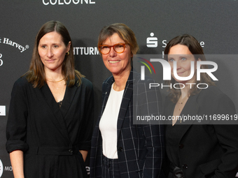 Bettina Boettinger, the TV presenter, Vanessa Bitter, news prize winner, and Sina Tonk, woman category winner, are seen on the red carpet of...