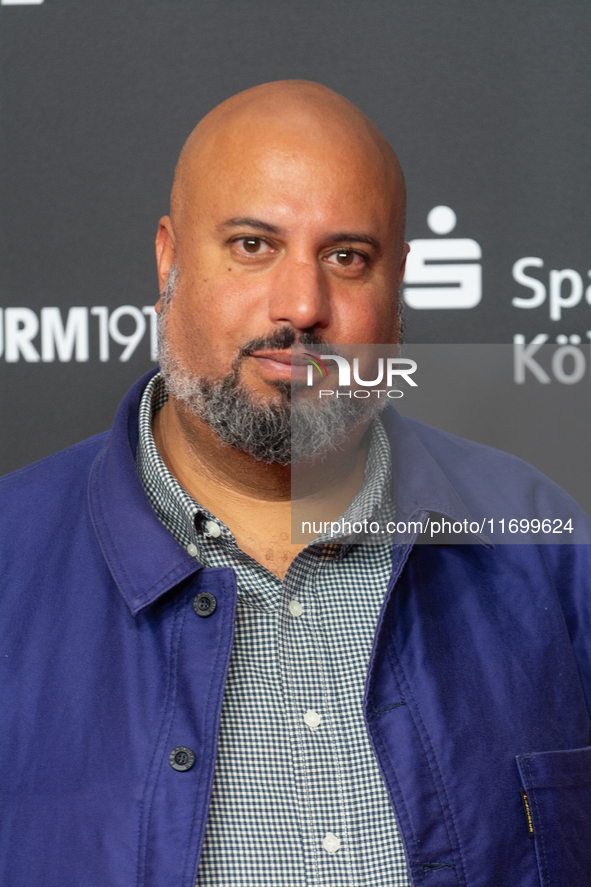 Michael Premo, a filmmaker who receives the Der Phoenix Preis, is seen on the red carpet of Film Palast in Cologne, Germany, on October 23,...