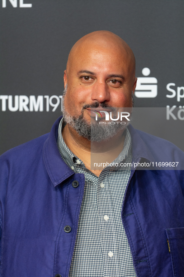 Michael Premo, a filmmaker who receives the Der Phoenix Preis, is seen on the red carpet of Film Palast in Cologne, Germany, on October 23,...