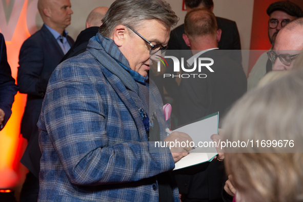 Hape Kerkeling, a German actor and writer, is greeted by his fans on the red carpet of the photocall for ''Total Normal - Hape Kerkeling'' a...