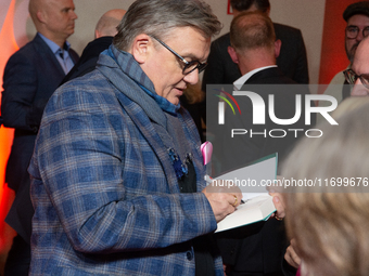 Hape Kerkeling, a German actor and writer, is greeted by his fans on the red carpet of the photocall for ''Total Normal - Hape Kerkeling'' a...