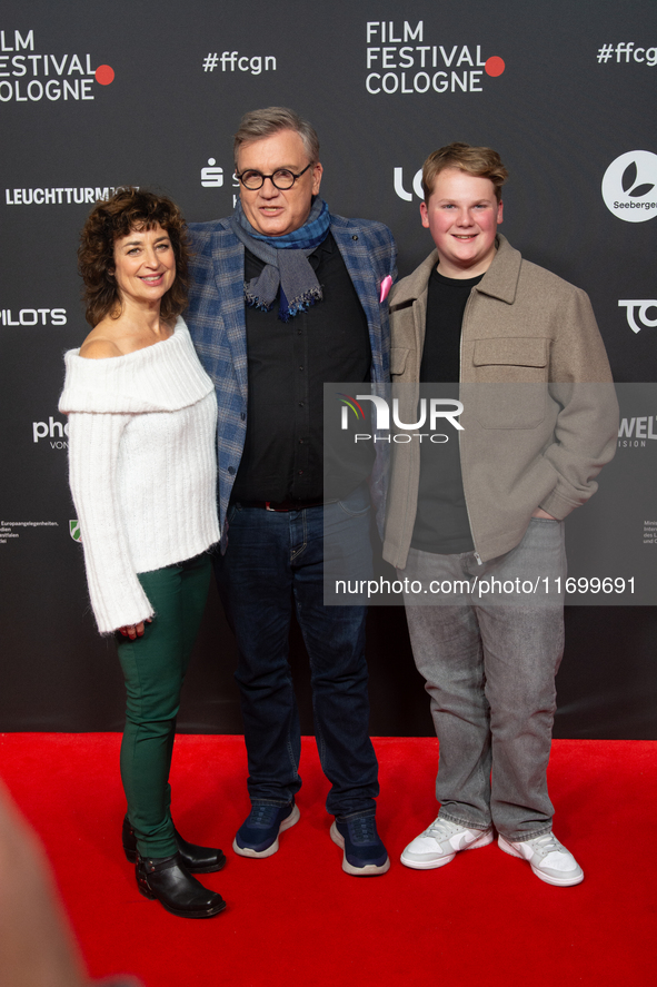 Hape Kerkeling, a German actor, Julius Weckauf, a German actor, and Isabel Varell, a German actress, are seen on the red carpet of the photo...