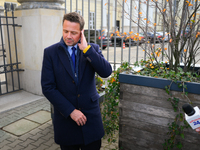 Mayor Rafal Trzaskowski is seen approaching protesters outside city hall during a rally against conditions in cat shelters in Warsaw, Poland...