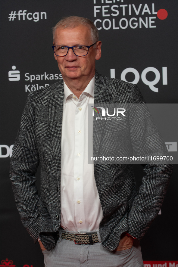 Guenther Jauch, a German TV presenter, is seen on the red carpet of the photocall for ''Total Normal - Hape Kerkeling'' at Film Palast in Co...