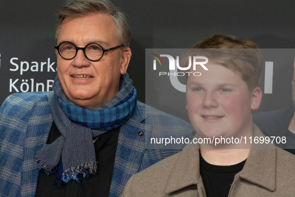 Hape Kerkeling, a German actor, and Julius Weckauf, a German actor, are seen on the red carpet of the photocall for ''Total Normal - Hape Ke...