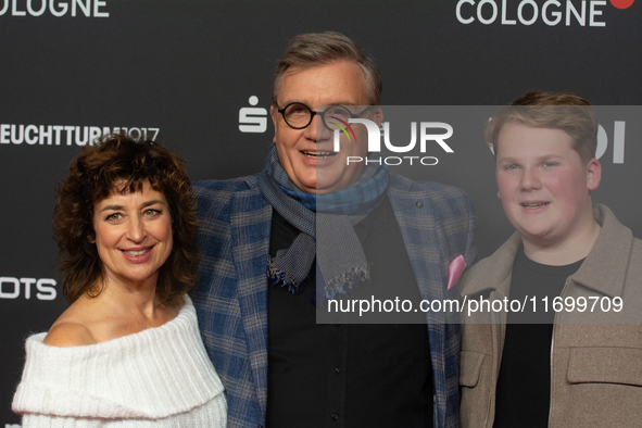 Hape Kerkeling, a German actor, Julius Weckauf, a German actor, and Isabel Varell, a German actress, are seen on the red carpet of the photo...