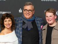 Hape Kerkeling, a German actor, Julius Weckauf, a German actor, and Isabel Varell, a German actress, are seen on the red carpet of the photo...