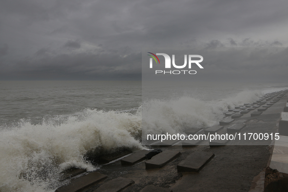 Waves overflow onto a damaged sea front before Cyclone Dana in Digha, West Bengal, on October 24, 2024. Cyclonic storm Dana currently barrel...