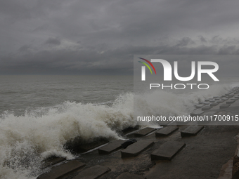 Waves overflow onto a damaged sea front before Cyclone Dana in Digha, West Bengal, on October 24, 2024. Cyclonic storm Dana currently barrel...