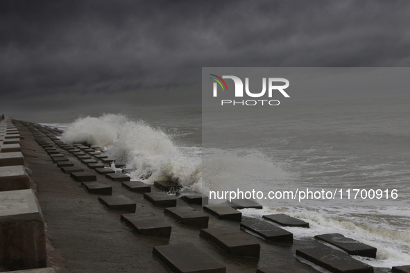 Waves overflow onto a damaged sea front before Cyclone Dana in Digha, West Bengal, on October 24, 2024. Cyclonic storm Dana currently barrel...