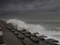 Waves overflow onto a damaged sea front before Cyclone Dana in Digha, West Bengal, on October 24, 2024. Cyclonic storm Dana currently barrel...