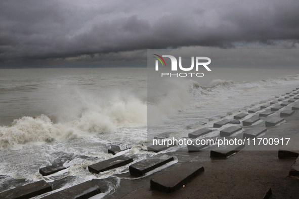 Waves overflow onto a damaged sea front before Cyclone Dana in Digha, West Bengal, on October 24, 2024. Cyclonic storm Dana currently barrel...