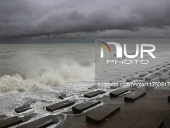 Waves overflow onto a damaged sea front before Cyclone Dana in Digha, West Bengal, on October 24, 2024. Cyclonic storm Dana currently barrel...