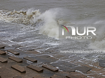 Waves overflow onto a damaged sea front before Cyclone Dana in Digha, West Bengal, on October 24, 2024. Cyclonic storm Dana currently barrel...