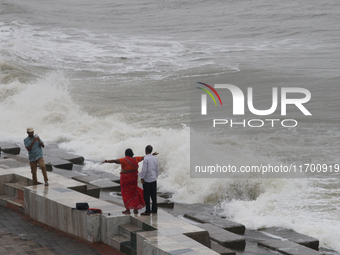 Waves overflow onto a damaged sea front before Cyclone Dana in Digha, West Bengal, on October 24, 2024. Cyclonic storm Dana currently barrel...