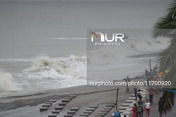 Waves overflow onto a damaged sea front before Cyclone Dana in Digha, West Bengal, on October 24, 2024. Cyclonic storm Dana currently barrel...