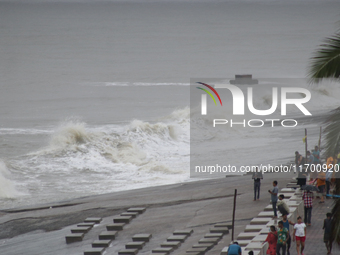 Waves overflow onto a damaged sea front before Cyclone Dana in Digha, West Bengal, on October 24, 2024. Cyclonic storm Dana currently barrel...