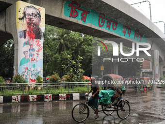 Rain starts in the capital Dhaka, Bangladesh, on October 24, 2024, due to the effect of cyclone 'Dana'. (