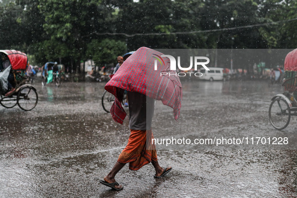 Rain starts in the capital Dhaka, Bangladesh, on October 24, 2024, due to the effect of cyclone 'Dana'. 