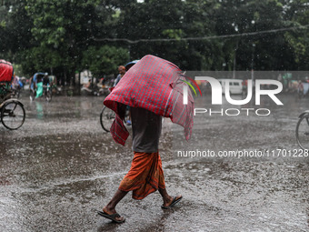 Rain starts in the capital Dhaka, Bangladesh, on October 24, 2024, due to the effect of cyclone 'Dana'. (