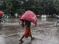 Rain starts in the capital Dhaka, Bangladesh, on October 24, 2024, due to the effect of cyclone 'Dana'. (