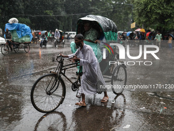 Rain starts in the capital Dhaka, Bangladesh, on October 24, 2024, due to the effect of cyclone 'Dana'. (