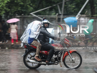 Rain starts in the capital Dhaka, Bangladesh, on October 24, 2024, due to the effect of cyclone 'Dana'. (