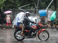 Rain starts in the capital Dhaka, Bangladesh, on October 24, 2024, due to the effect of cyclone 'Dana'. (