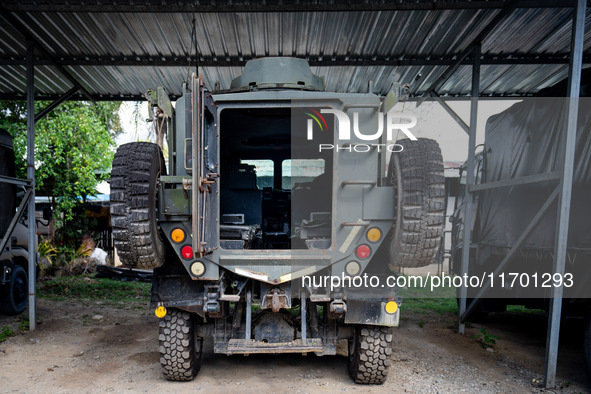 A large tank is parked within the intelligence compound before the operation begins. Special Forces, the Black Army, and Volunteer Force Ope...