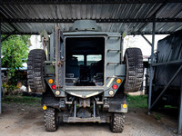 A large tank is parked within the intelligence compound before the operation begins. Special Forces, the Black Army, and Volunteer Force Ope...