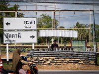 An armed soldier works at a checkpoint in Pattani. Special Forces, the Black Army, and Volunteer Force Operations in Thailand's Deep South p...