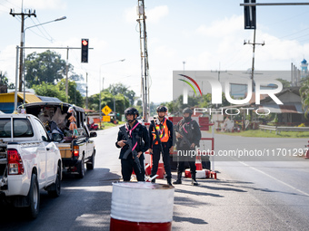 Soldiers work at a checkpoint in Pattani. Special Forces, the Black Army, and Volunteer Force Operations in Thailand's Deep South perform in...