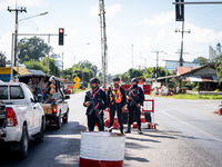 Soldiers work at a checkpoint in Pattani. Special Forces, the Black Army, and Volunteer Force Operations in Thailand's Deep South perform in...