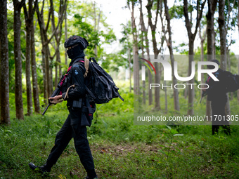 Snipers patrol the jungle in Pattani. Special Forces, the Black Army, and Volunteer Force Operations in Thailand's Deep South perform intell...