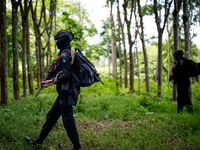 Snipers patrol the jungle in Pattani. Special Forces, the Black Army, and Volunteer Force Operations in Thailand's Deep South perform intell...