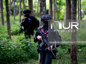 Snipers patrol the jungle in Pattani. Special Forces, the Black Army, and Volunteer Force Operations in Thailand's Deep South perform intell...