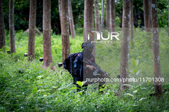 Snipers patrol the jungle in Pattani. Special Forces, the Black Army, and Volunteer Force Operations in Thailand's Deep South perform intell...