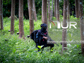 Snipers patrol the jungle in Pattani. Special Forces, the Black Army, and Volunteer Force Operations in Thailand's Deep South perform intell...