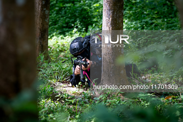 Snipers patrol the jungle in Pattani. Special Forces, the Black Army, and Volunteer Force Operations in Thailand's Deep South perform intell...