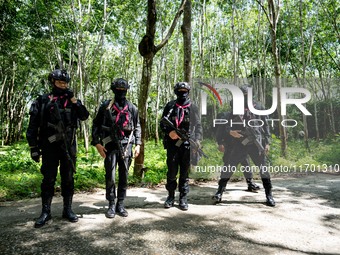 Snipers patrol the jungle in Pattani. Special Forces, the Black Army, and Volunteer Force Operations in Thailand's Deep South perform intell...