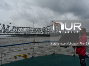 Storm clouds are seen over Kolkata, India, on October 24, 2024, as Severe Cyclonic Storm Dana starts its landfall process. The Regional Mete...