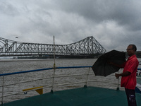 Storm clouds are seen over Kolkata, India, on October 24, 2024, as Severe Cyclonic Storm Dana starts its landfall process. The Regional Mete...