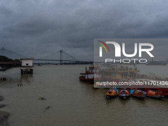 Storm clouds are seen over Kolkata, India, on October 24, 2024, as Severe Cyclonic Storm Dana starts its landfall process. The Regional Mete...