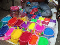 Sellers from Uttar Pradesh State sell Rangoli colors for Diwali home decoration in Siliguri, India, on October 24, 2024. (